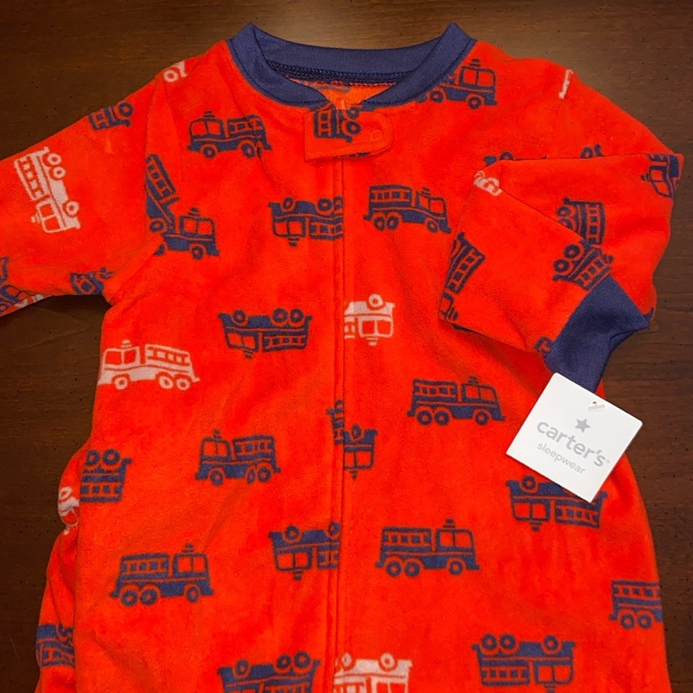 Carter’s toddler pajamas. One pice with enclosed feet. New with tags!